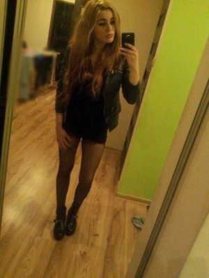 Kinky blonde taking pic in her hot outfit before going out for naughty party