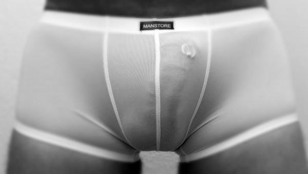 Frenum piercing behind see-thru underwear