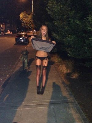 Drunk teen lifting up her dress