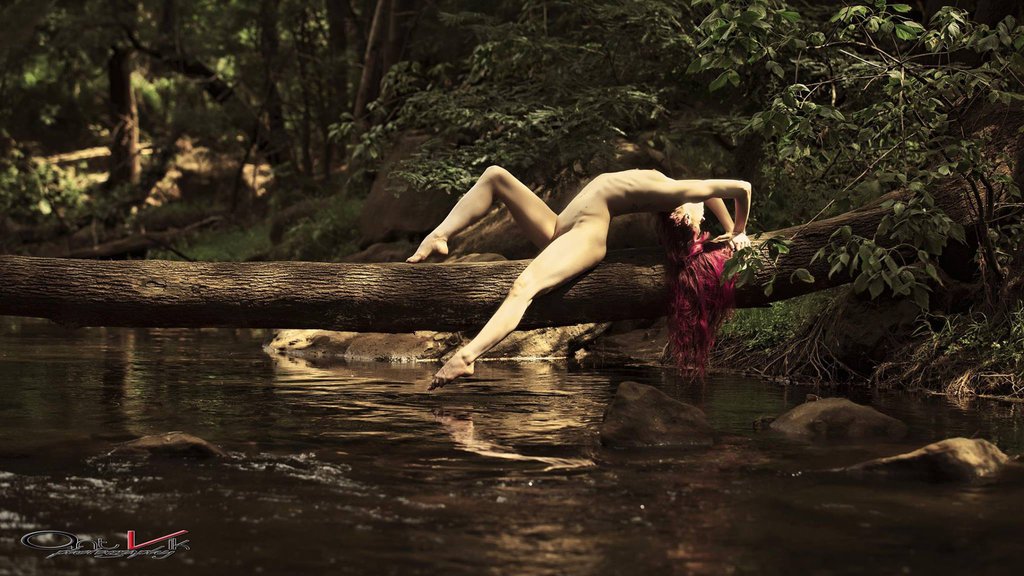 Petite on a tree over the river