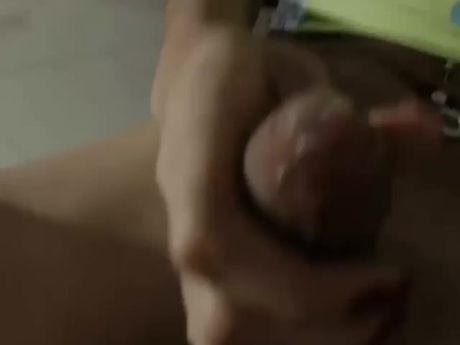 Blonde shemale strokes her cock.