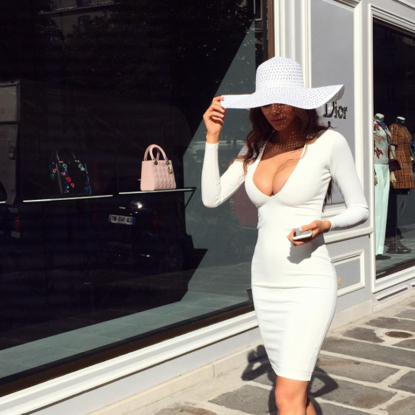 Rich babe in tight white dress