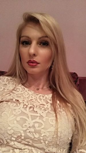 Dolled up blonde bimbo