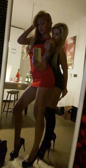 Bimbo dolls posing for another mirror shot during houseparty