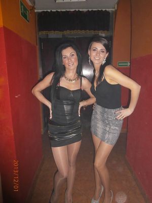 Party bimbos in shiny nylons and mini skirts