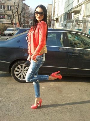 Brunette posing outdoors