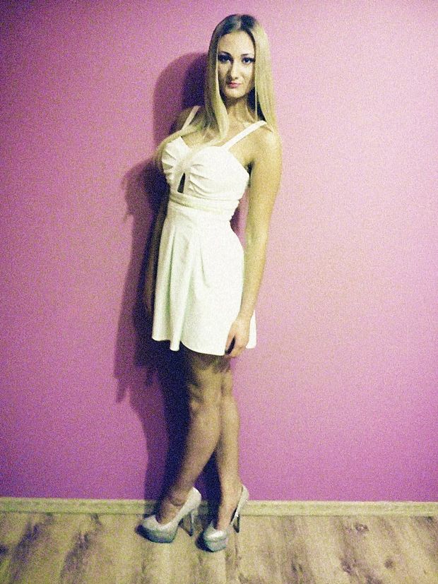 Nice blonde in white short dress and platforms