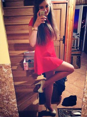 Cute babe in red mini dress and white heels