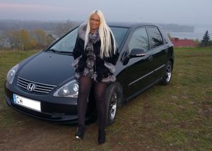 Blonde barbie and car