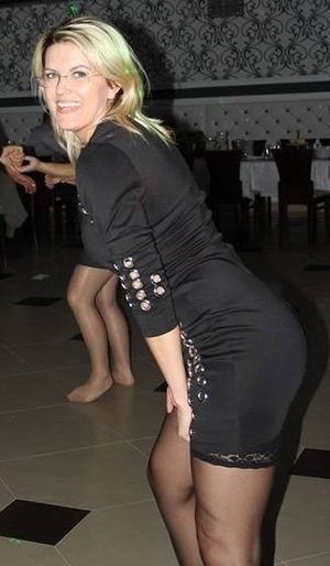 Nasty blonde mummy teasing with her stockings during party