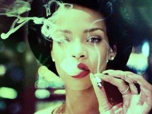 Rihanna burning a bone