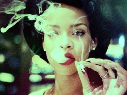 Rihanna burning a bone
