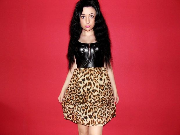 Brunette bimbo doll in her new outfit
