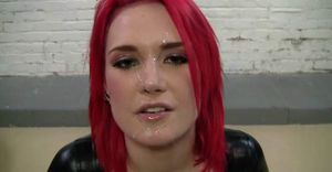 hot redhead with big tits in latex costume