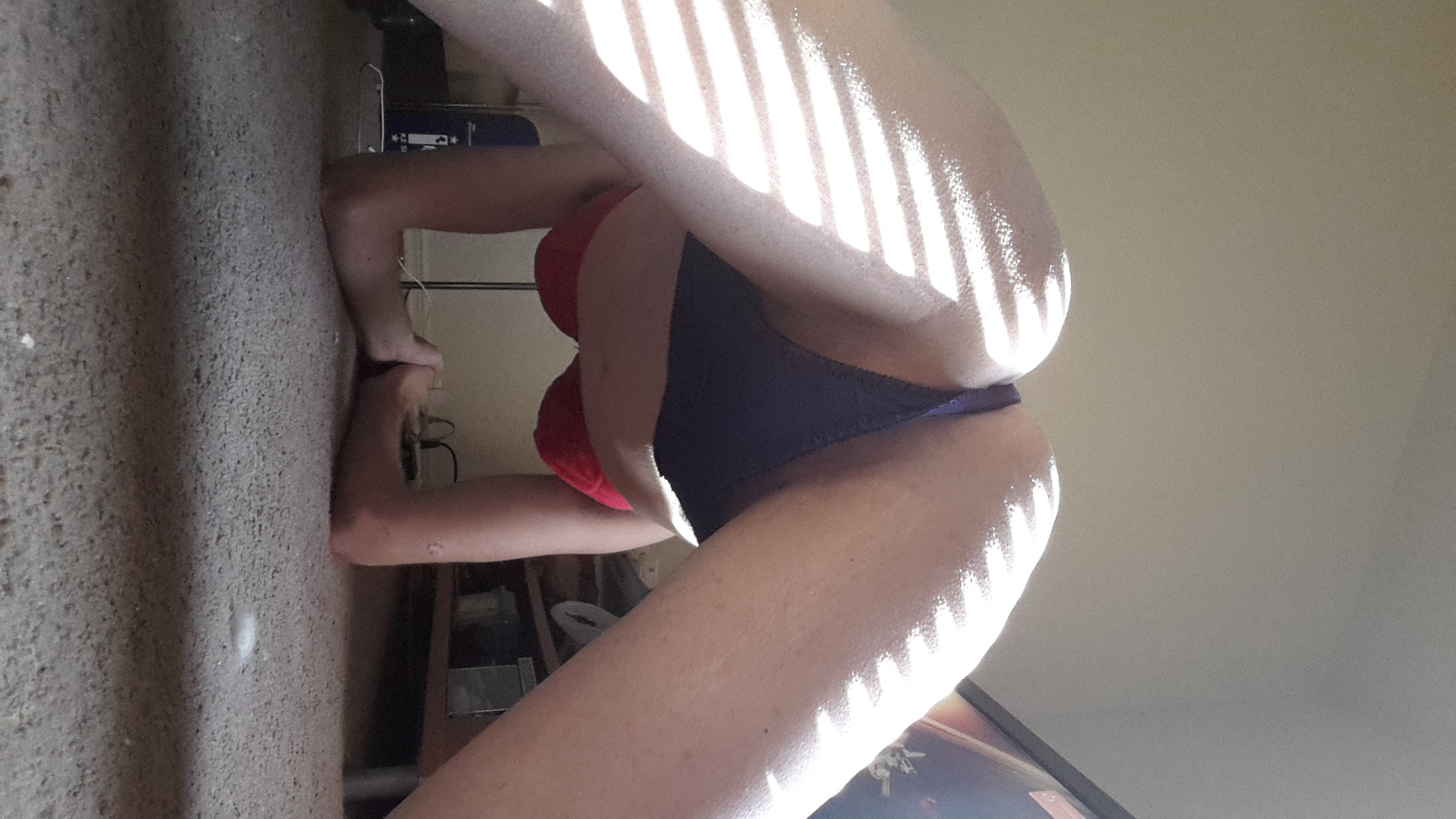 Bending over and spreading my legs