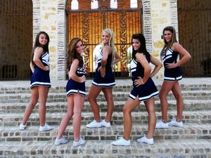 Coed cheerleaders posing at... the chapel!?!