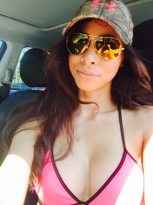 Camo hat and a pink top looks good to me