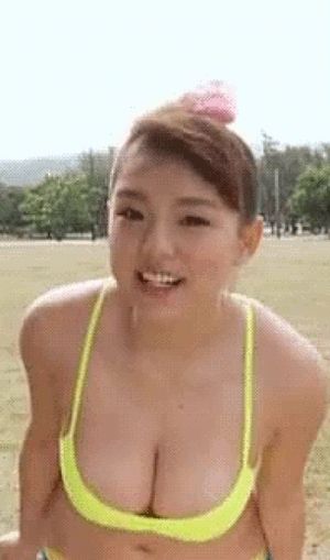 animated asian bikini bouncing bouncing_breasts breasts cleavage gif jiggle navel non-nude photo smile smiling