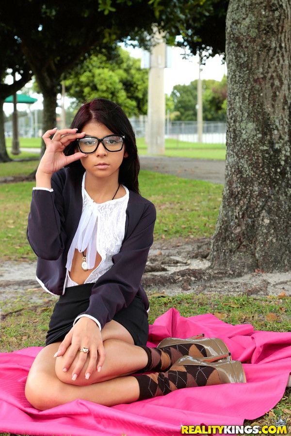 Super cute Sadie Pop wearing glasses in the park