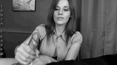 Her Knowing Eyes While She Jerks Off His Dick