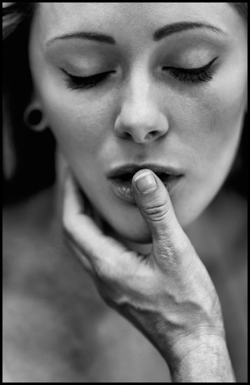 His fingers in her mouth