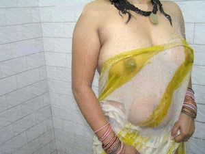 Indian big boobs aunty in wet saree on Holi
