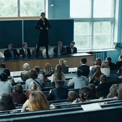 hot woman undressing in front of students