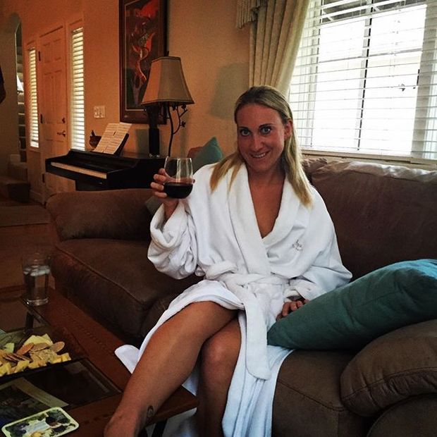 Sexy mild in robe with amazing tan legs