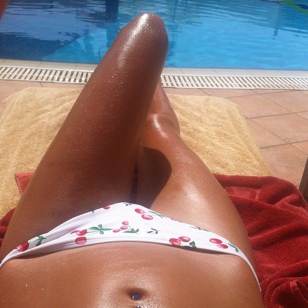 Tanning in my floral bikini