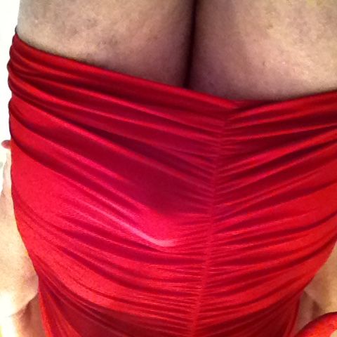 bulging out of dress