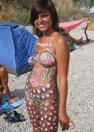 Getting painted naked while camping.