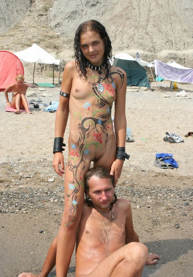 She got bodypainted nude while camping.