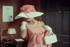 STRIPPING DOWN TO A BLACK CORSET GIF