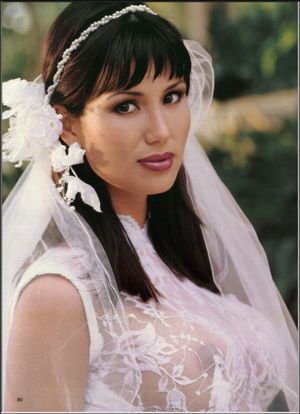 I'd like to see the rest of that dress. Nice see through top.