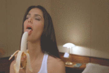 ..licking a banana..