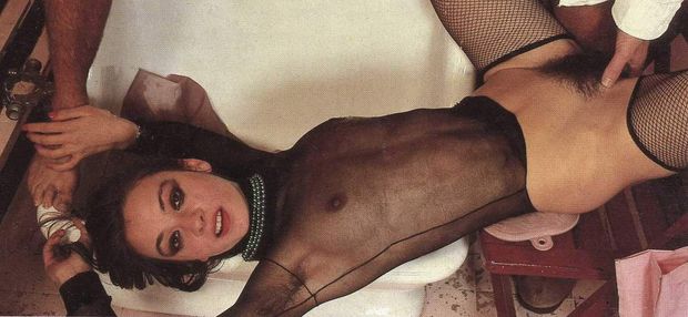 Catherine Ringer in a see through top with someone playing with her pussy!