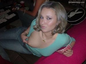 Sexy blonde amateur babe slips her boob out