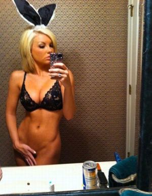 Bottomless blonde bunny iPhone self pic.