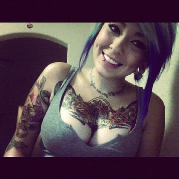 beautiful inked teen with blue hair