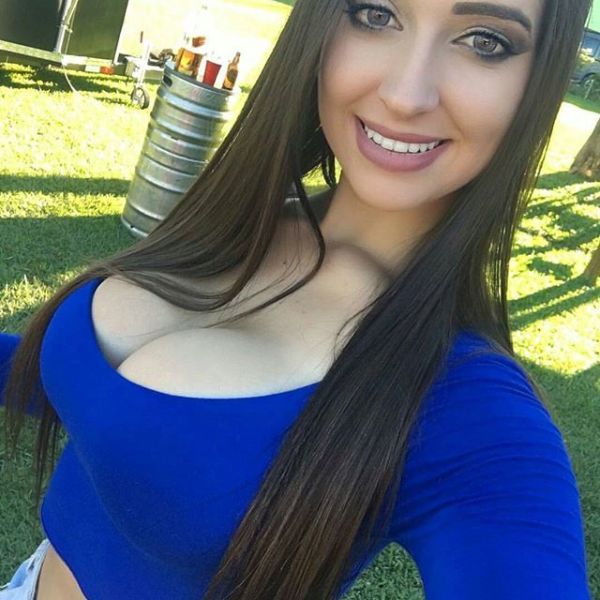 Hot brunette with huge tits