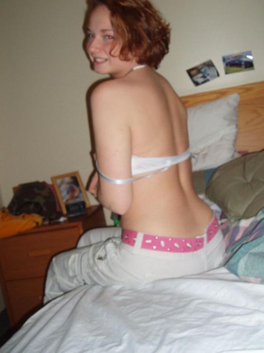 Cute hedhead amateur sit on bed