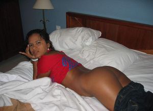 Ebony teen on bed