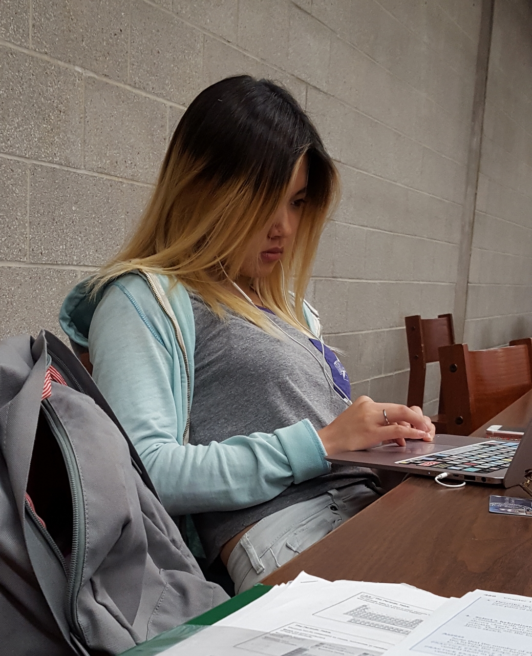 Beautiful Chinese College Student Studies in Library