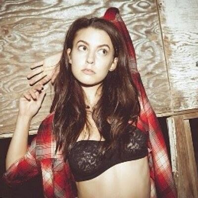 Just showing off her bra.