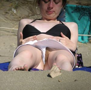 Amateur teen with hairy cameltoe and pussy upskirt