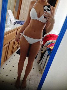 Babe taking a selfie in white lingerie