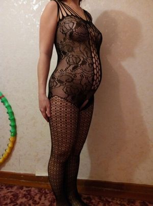 Pregnant woman in fishnet
