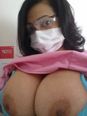Flashing her tits before she sees a patient