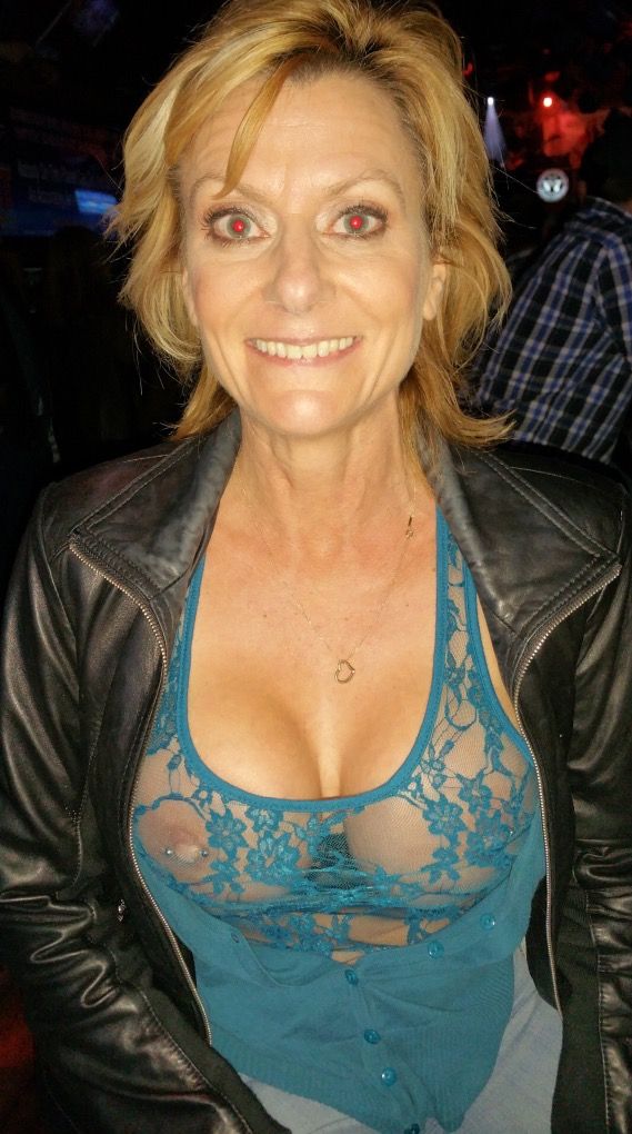 On vacation wearing her lace see thru top