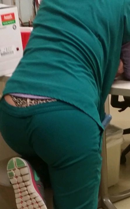 Nice thong peeking out of her scrubs